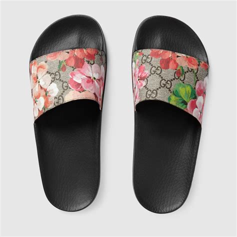 gucci gg supreme slide|Gucci slides with blue flowers.